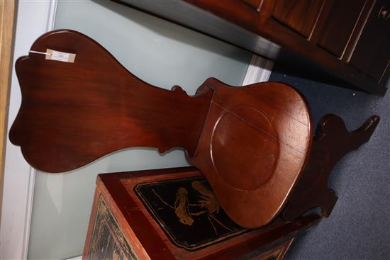 A pair of George III mahogany hall chairs